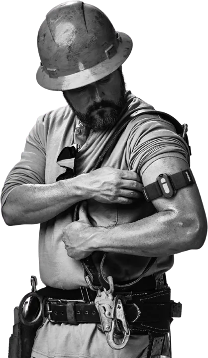 Worker adjusting an Epicore armband on their upper arm
